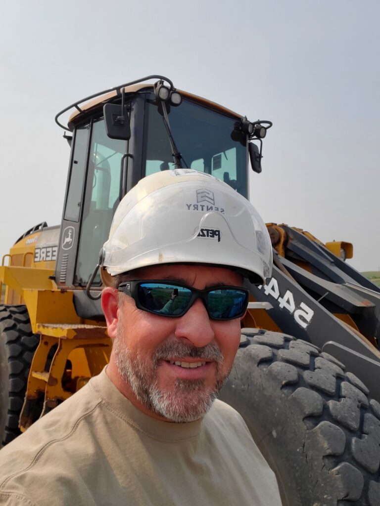 John R. Souza in the field