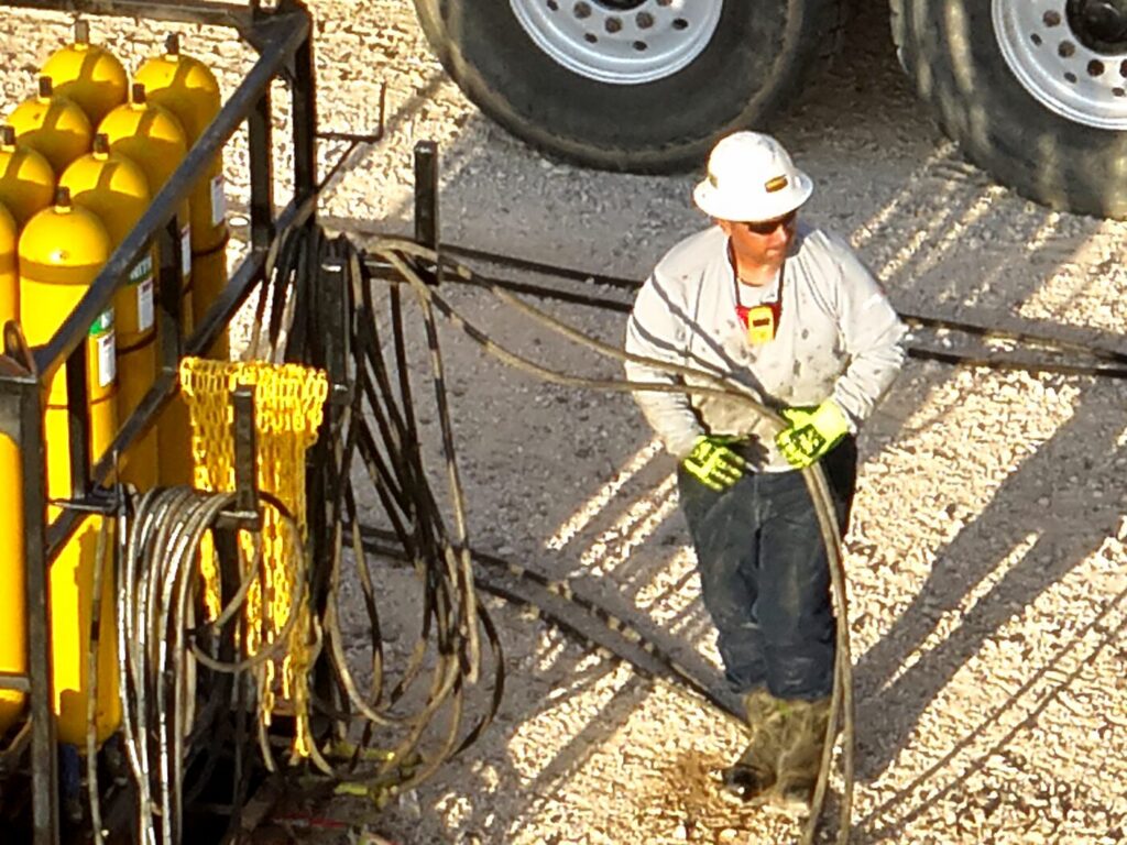 Worker on location wearing a Monitor Mate